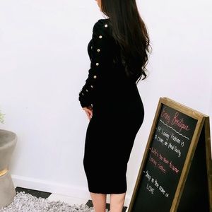 Woman’s black mid dress